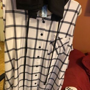 Sleeveless top with a hoodie